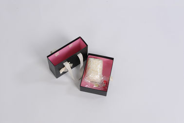 Luxusflachgehäuse-Geschenkbox-magnetische faltende Geschenkbox mit Band-Schließung